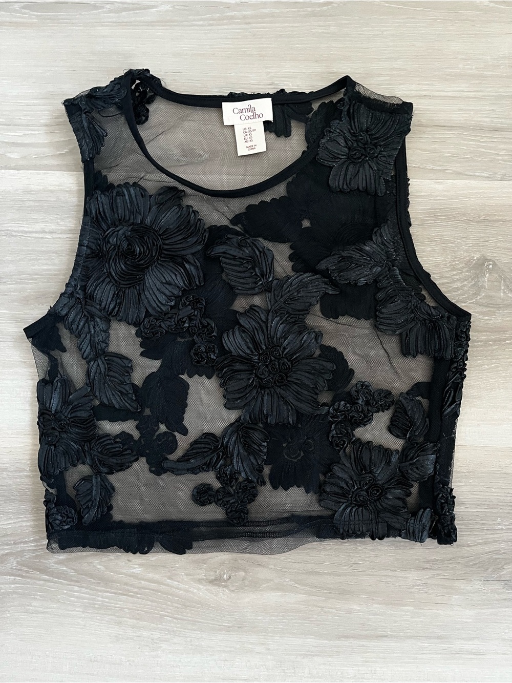 Black mesh top with Floral Appliqué.